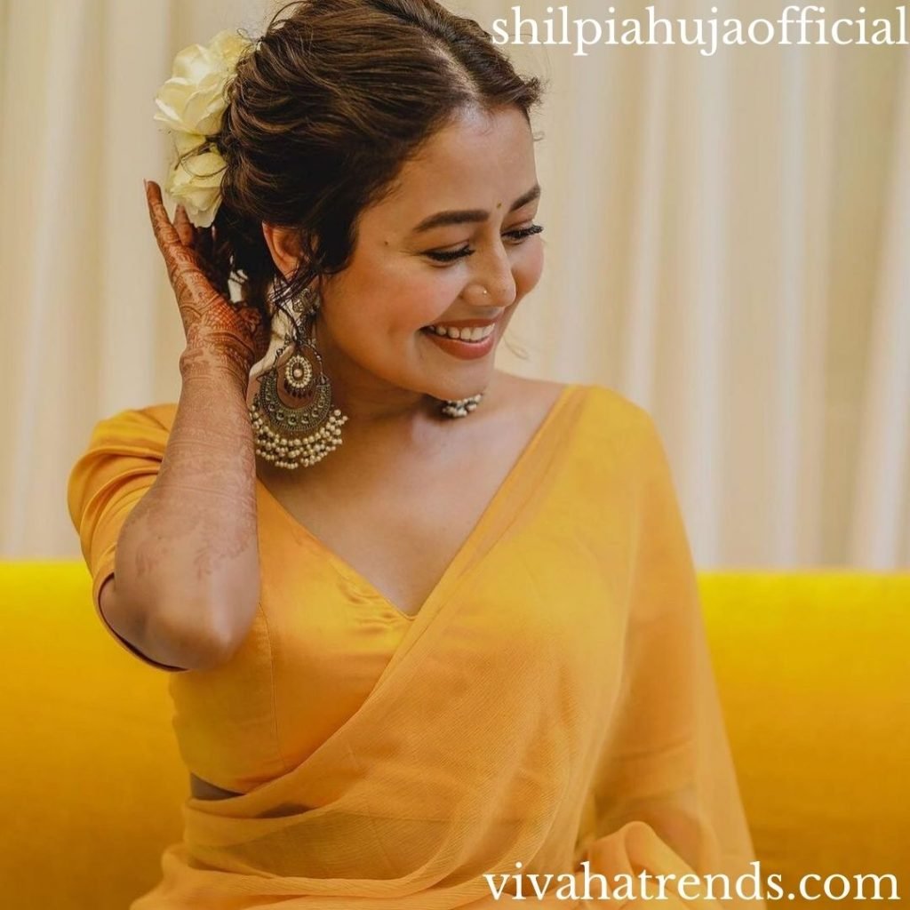 Neha kakkar's Haldi & Mehendi ceremony outfits